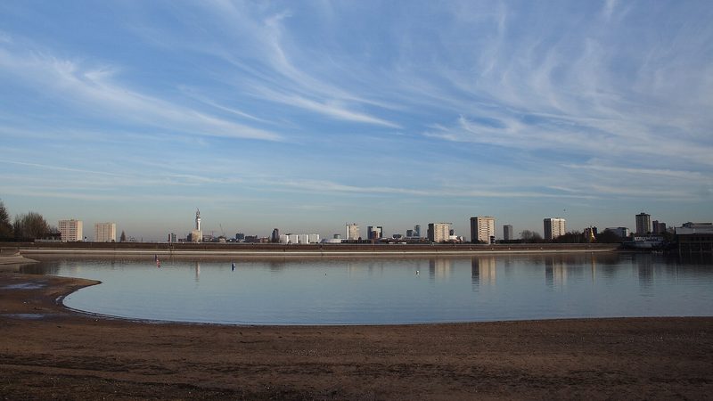 Edgbaston Reservoir with Birmingham city centre beyond the dam, photographed in 2008.